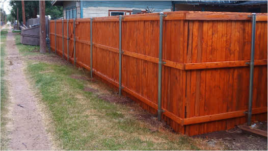 Backyard Fence Wood Stained in Norman Ok