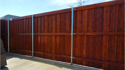 Residential fence construction with high quality stains